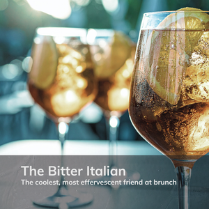 Three amber Bitter Italian spritzes served over ice with orange slices